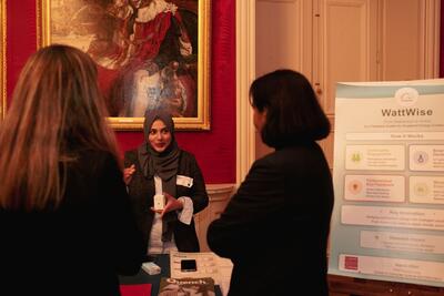 Asma Irfan presenting WattWise at the Alumni Awards 2026