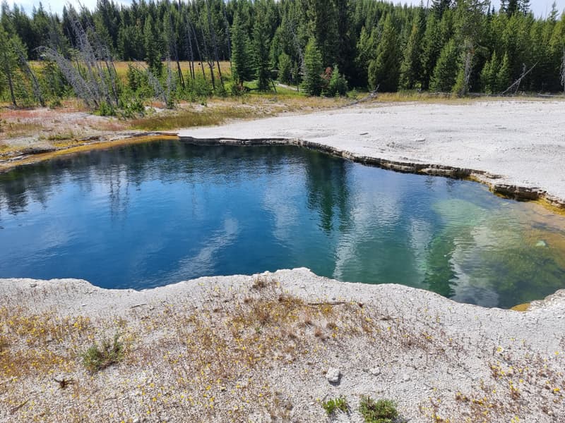 Blue thermal pool landscape in Yellowstone